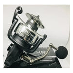 Load image into Gallery viewer, Pioneer Altitude Claassic Tough Saltwater series spinning reel on box  image

